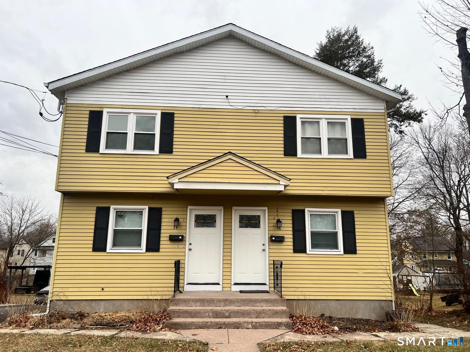 34 Norman Street Manchester, CT 06040 - Photo 1 of 19 a front view of a house