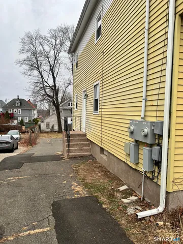 a view of large building with trees