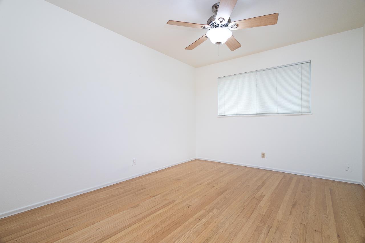 2855 La Colina Way Carmichael, CA 95608 - Photo 15 of 25 an empty room with a window and a ceiling fan