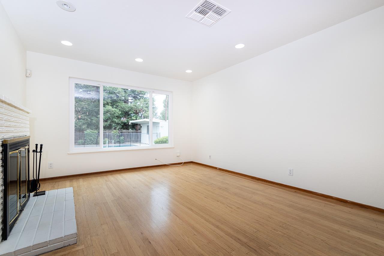 2855 La Colina Way Carmichael, CA 95608 - Photo 5 of 25 a view of an empty room with wooden floor and a window