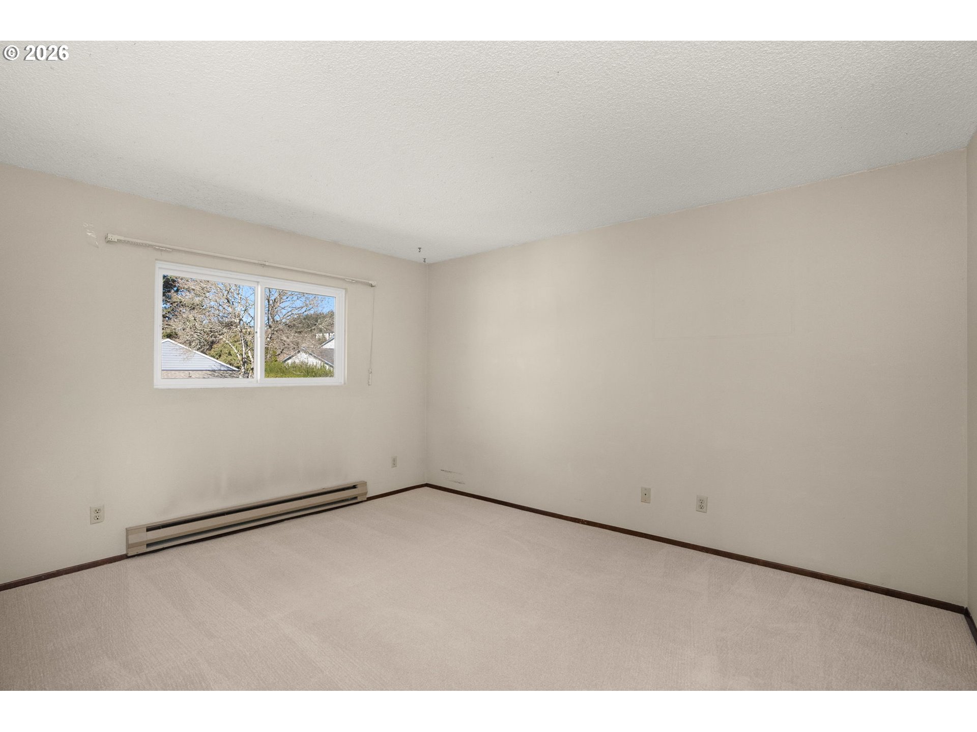 10820 Southwest Meadowbrook Drive, Unit 62 Portland, OR 97224 - Photo 18 of 46 Primary Bedroom