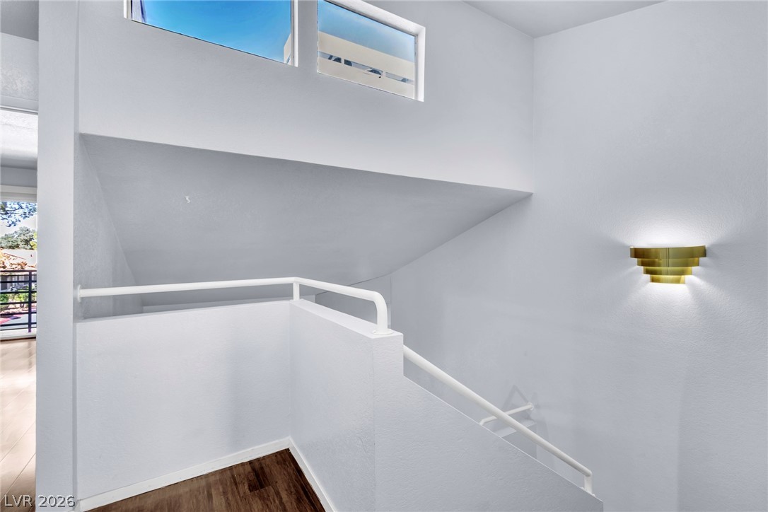 6250 West Flamingo Road, Unit 98 Las Vegas, NV 89103 - Photo 19 of 40 Stairs featuring wood finished floors