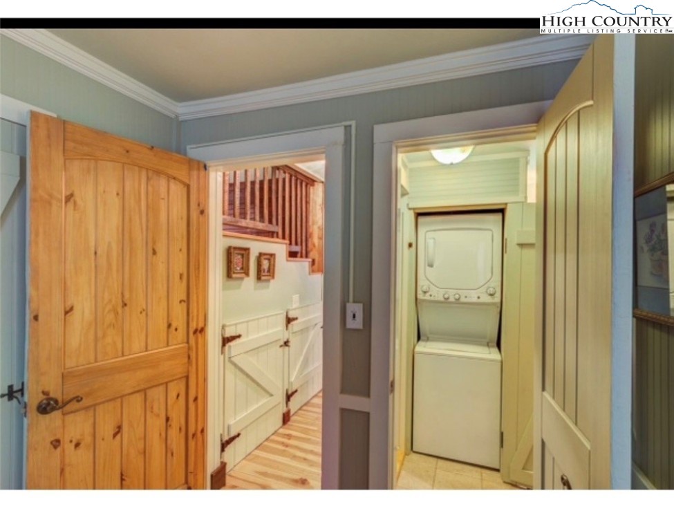 392 Old Danner Road Vilas, NC 28692 - Photo 17 of 34 a view of a hallway with wooden floor