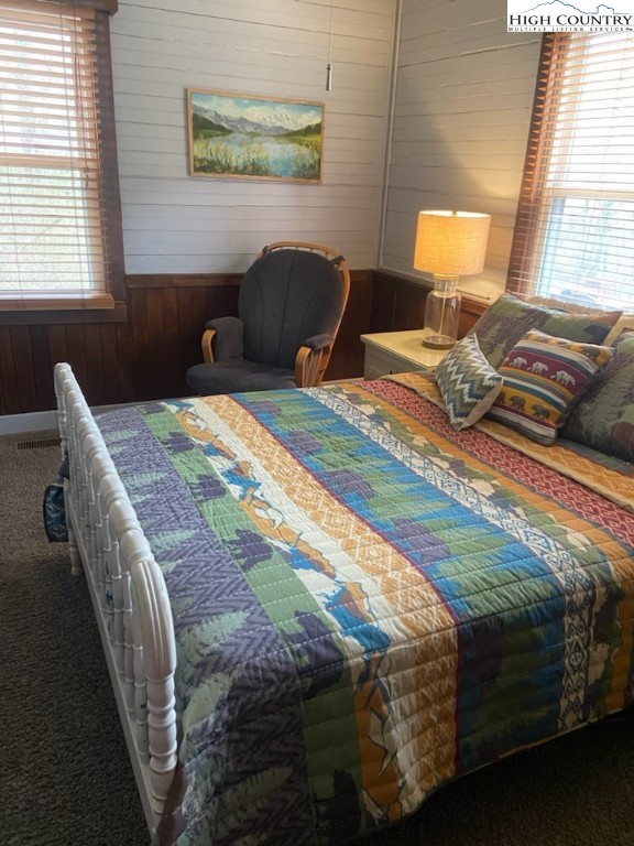 392 Old Danner Road Vilas, NC 28692 - Photo 18 of 34 a bedroom with a bed and a window