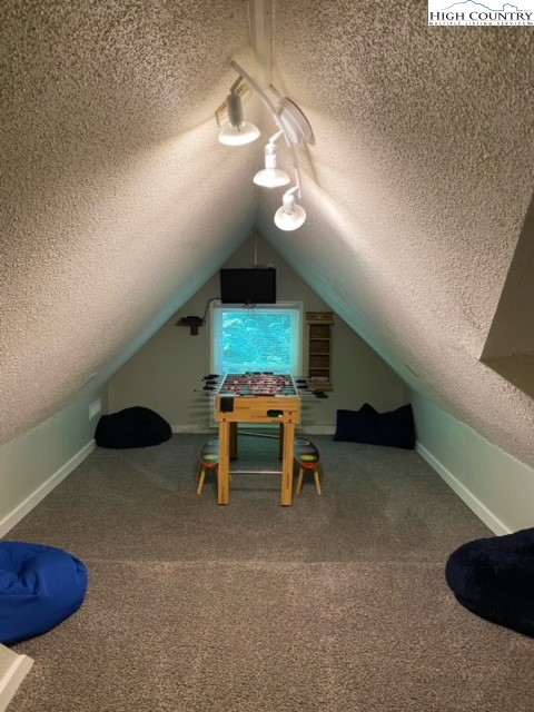 392 Old Danner Road Vilas, NC 28692 - Photo 23 of 34 a view of a livingroom with furniture and chandelier