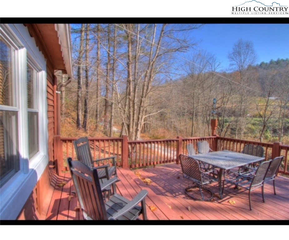 392 Old Danner Road Vilas, NC 28692 - Photo 26 of 34 a view of a room with furniture and wooden floor