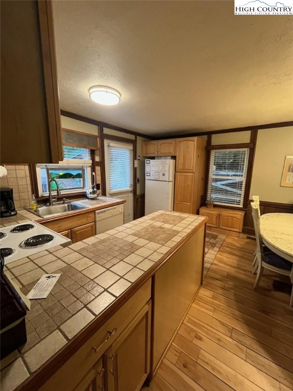 392 Old Danner Road Vilas, NC 28692 - Photo 10 of 34 a spacious bathroom with a granite countertop sink and a mirror