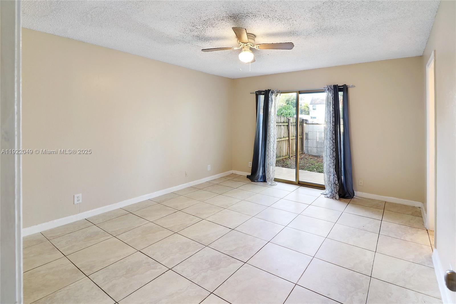 6533 Harbour Road North Lauderdale, FL 33068 - Photo 11 of 20 a view of an empty room with a window