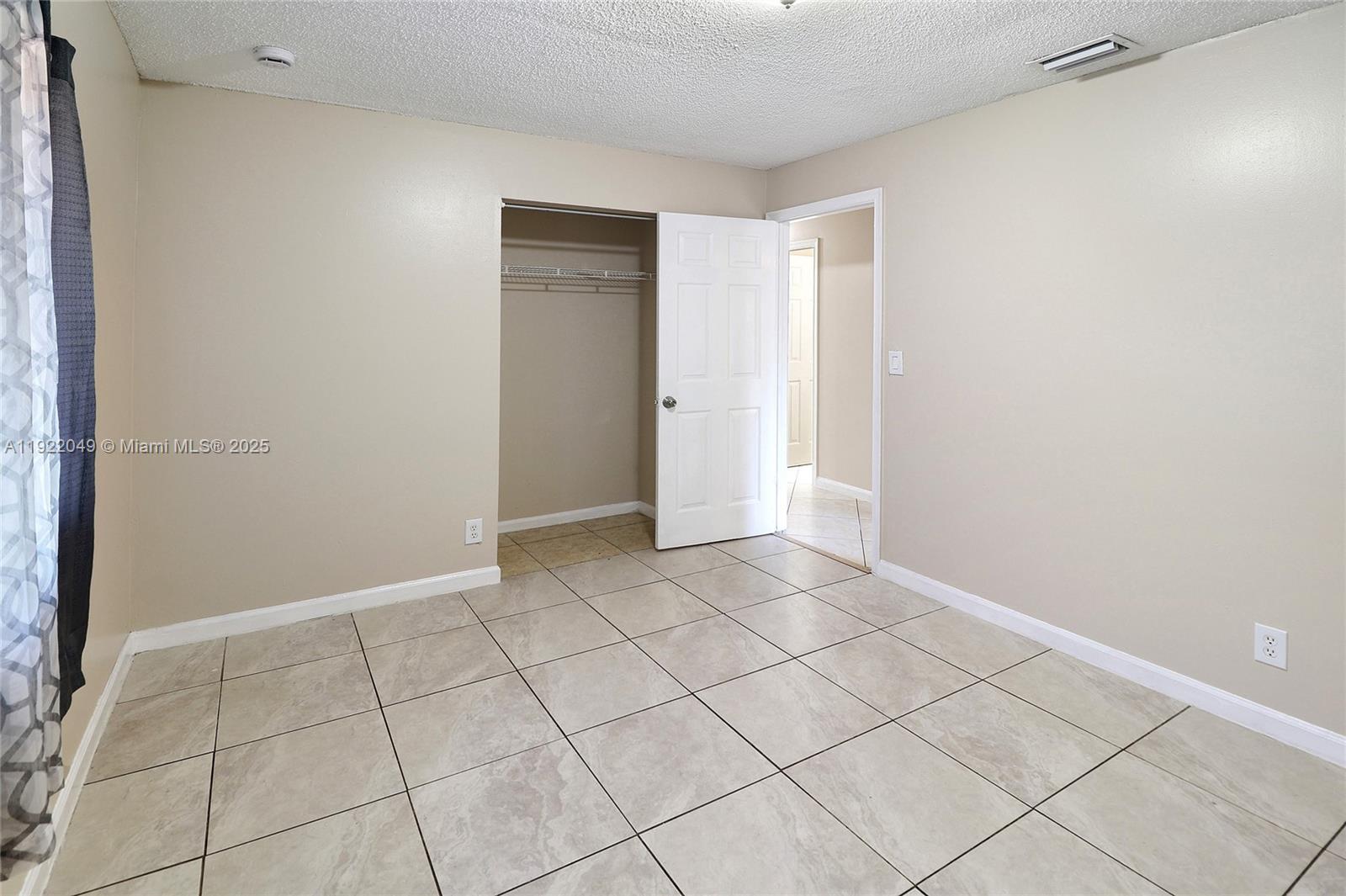 6533 Harbour Road North Lauderdale, FL 33068 - Photo 15 of 20 a view of an empty room and window