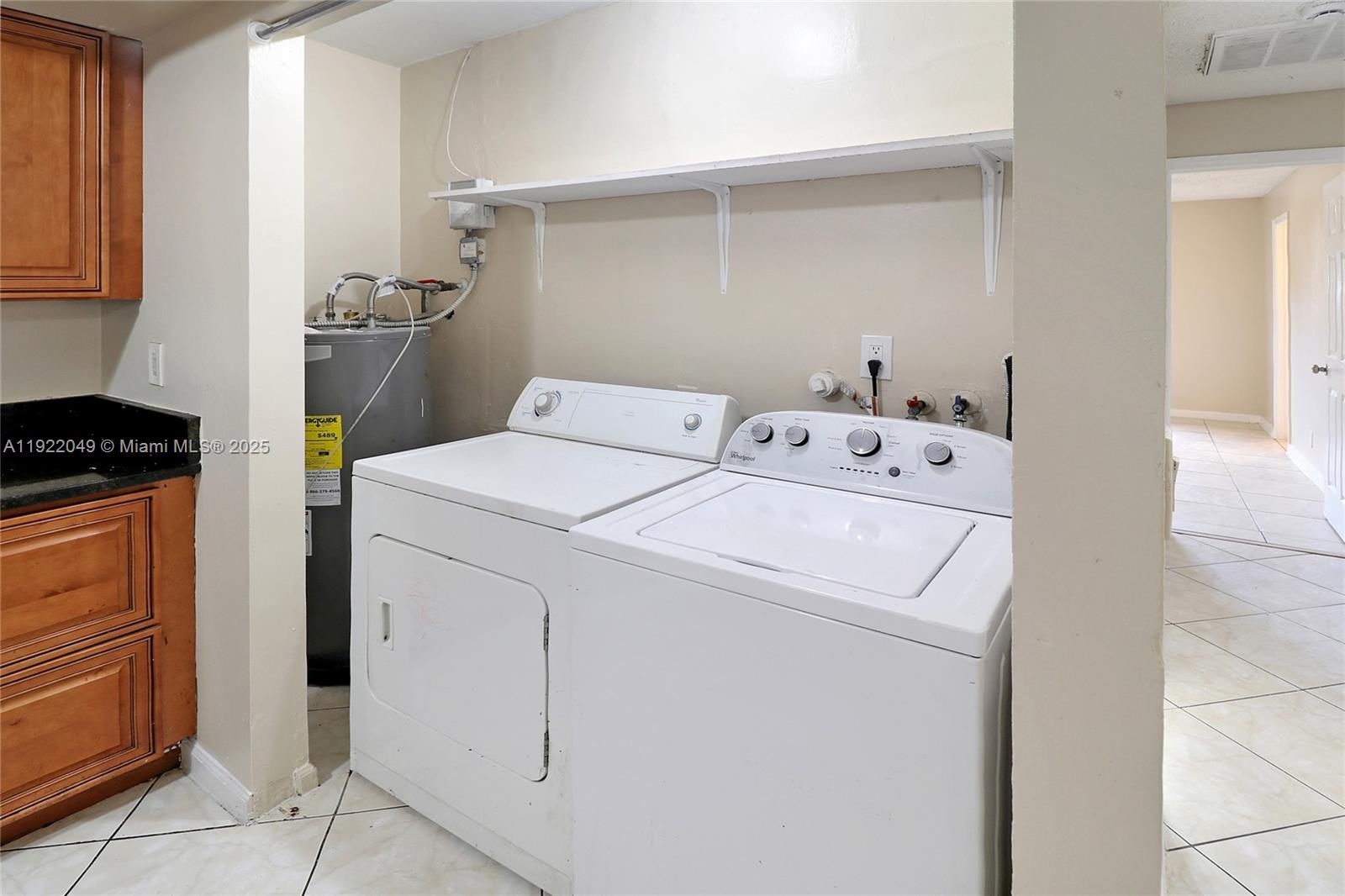6533 Harbour Road North Lauderdale, FL 33068 - Photo 18 of 20 a utility room with dryer and washer