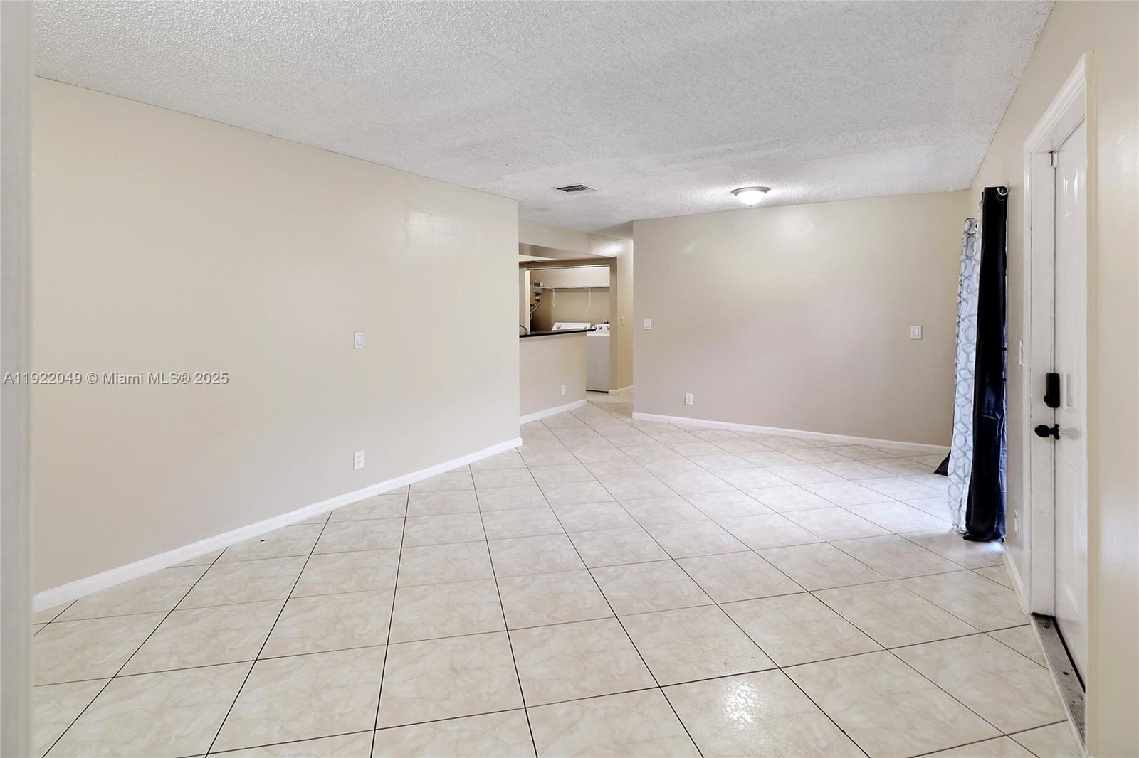 6533 Harbour Road North Lauderdale, FL 33068 - Photo 7 of 20 a view of an empty room with a window