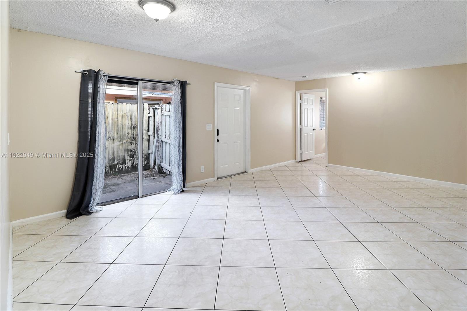 6533 Harbour Road North Lauderdale, FL 33068 - Photo 9 of 20 a view of an empty room and window