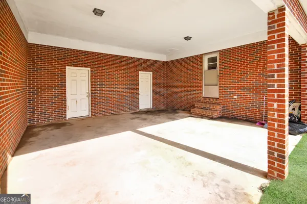 a view of a kitchen with cabinets