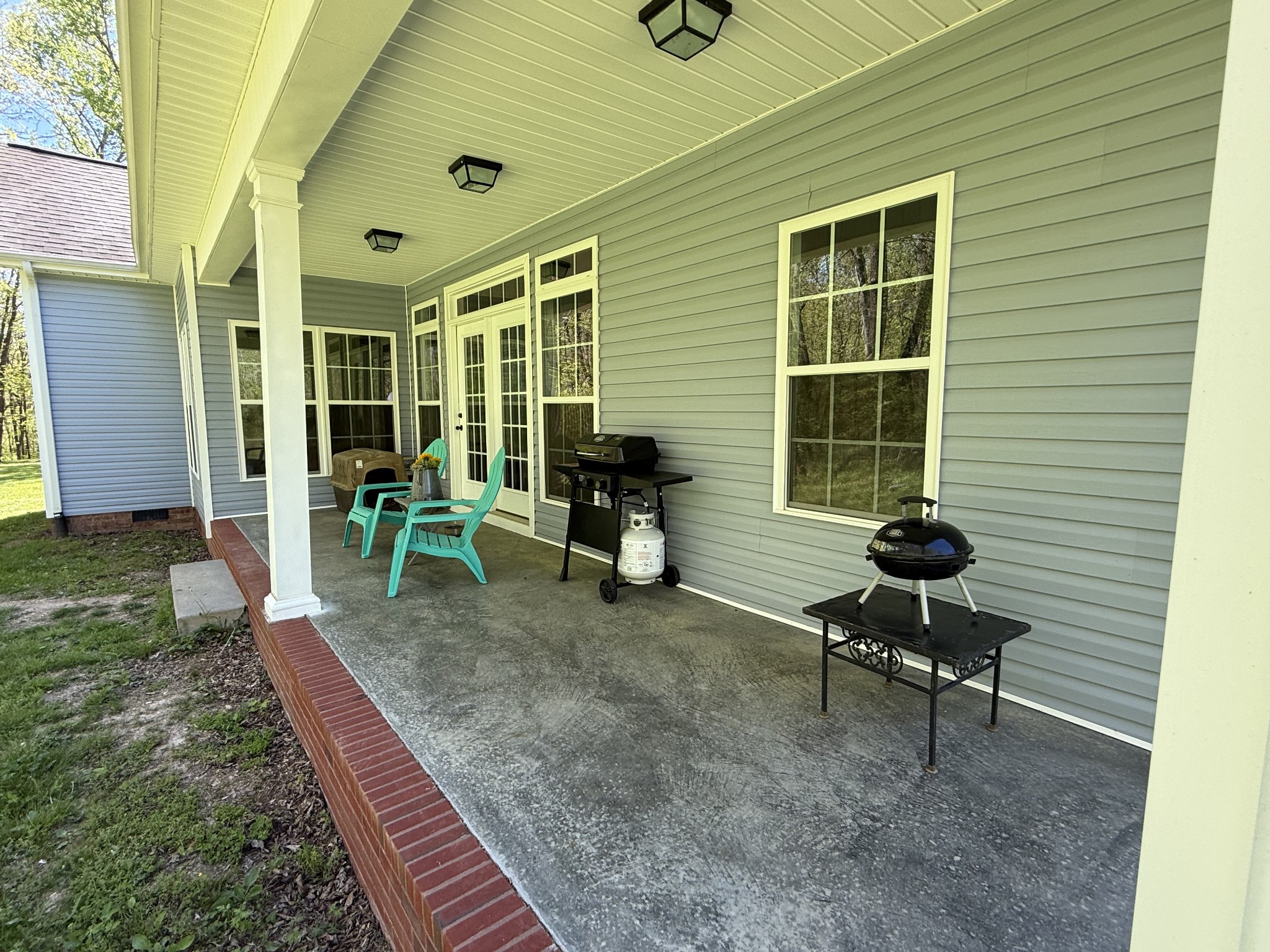 6591 Clear Creek Road Pulaski, TN 38478 - Photo 3 of 40 a view of a chairs in a backyard
