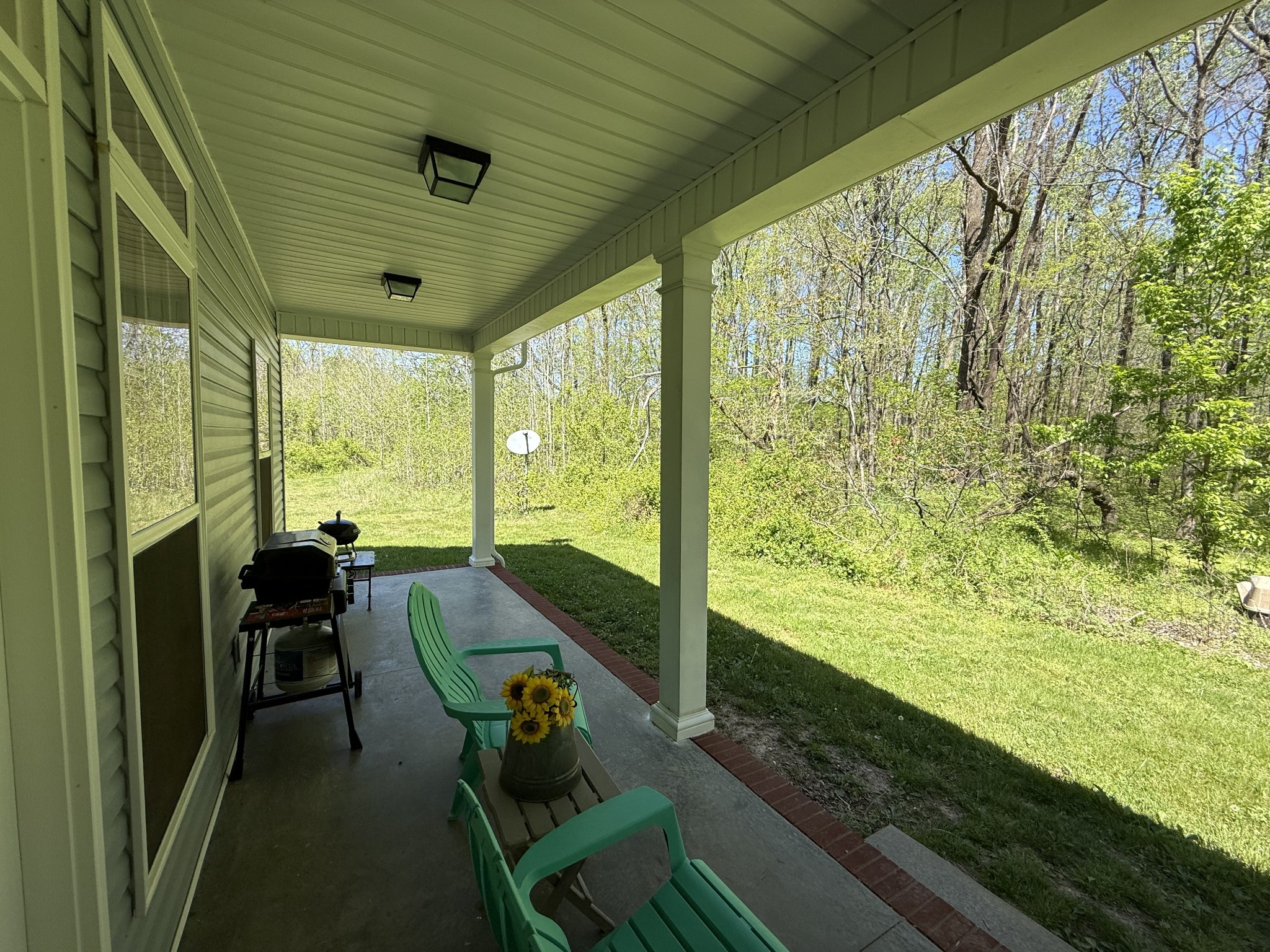 6591 Clear Creek Road Pulaski, TN 38478 - Photo 4 of 40 a balcony with furniture and a garden