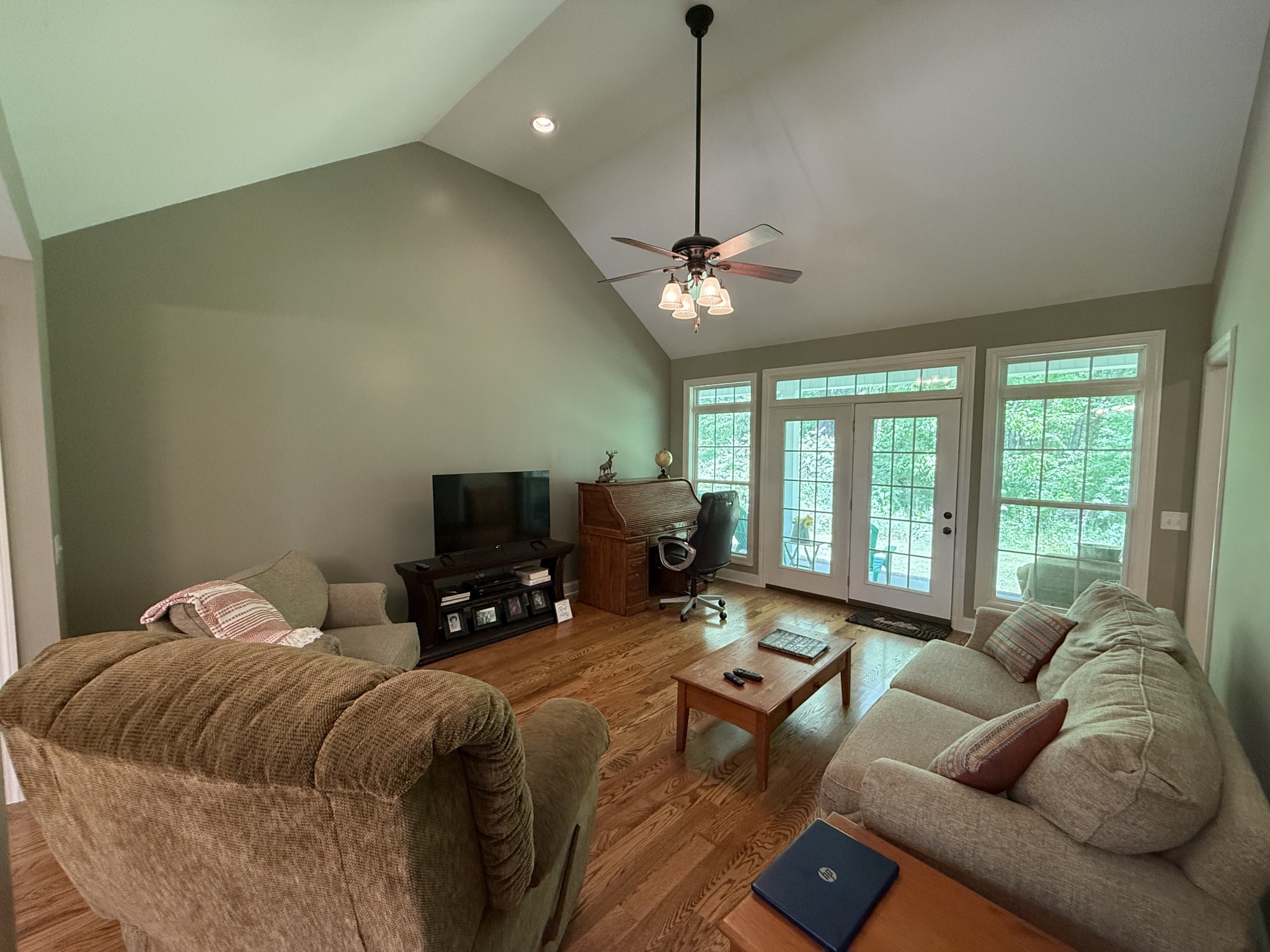6591 Clear Creek Road Pulaski, TN 38478 - Photo 7 of 40 a living room with furniture ceiling fan and a flat screen tv
