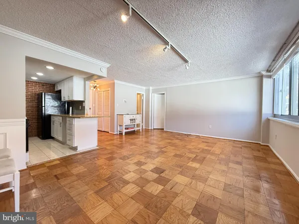 a view of a kitchen with a sink