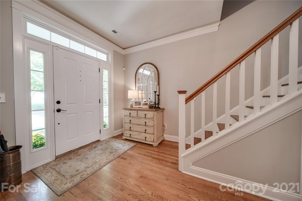 2513 Lower Assembly Drive Fort Mill, SC 29708 - Photo 8 of 47 a view of entryway with wooden floor