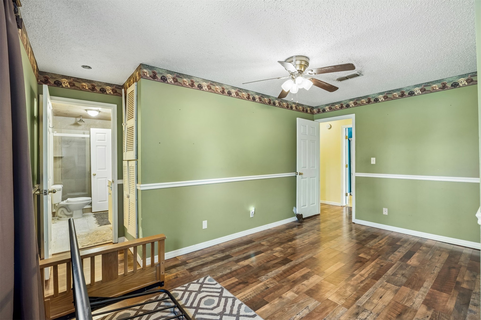 85013 Avant Road Yulee, FL 32097 - Photo 14 of 46 a view of a chandelier fan and entryway