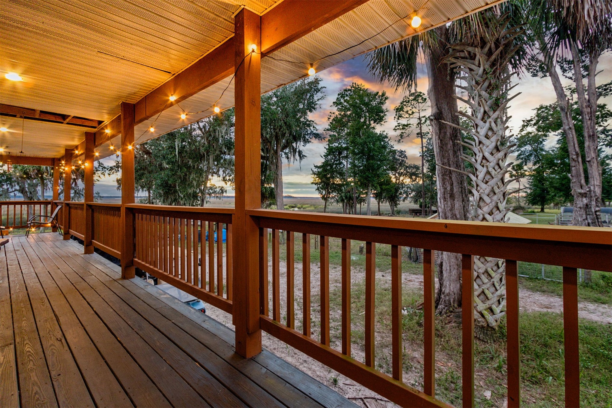85013 Avant Road Yulee, FL 32097 - Photo 21 of 46 a view of balcony with wooden floor and fence