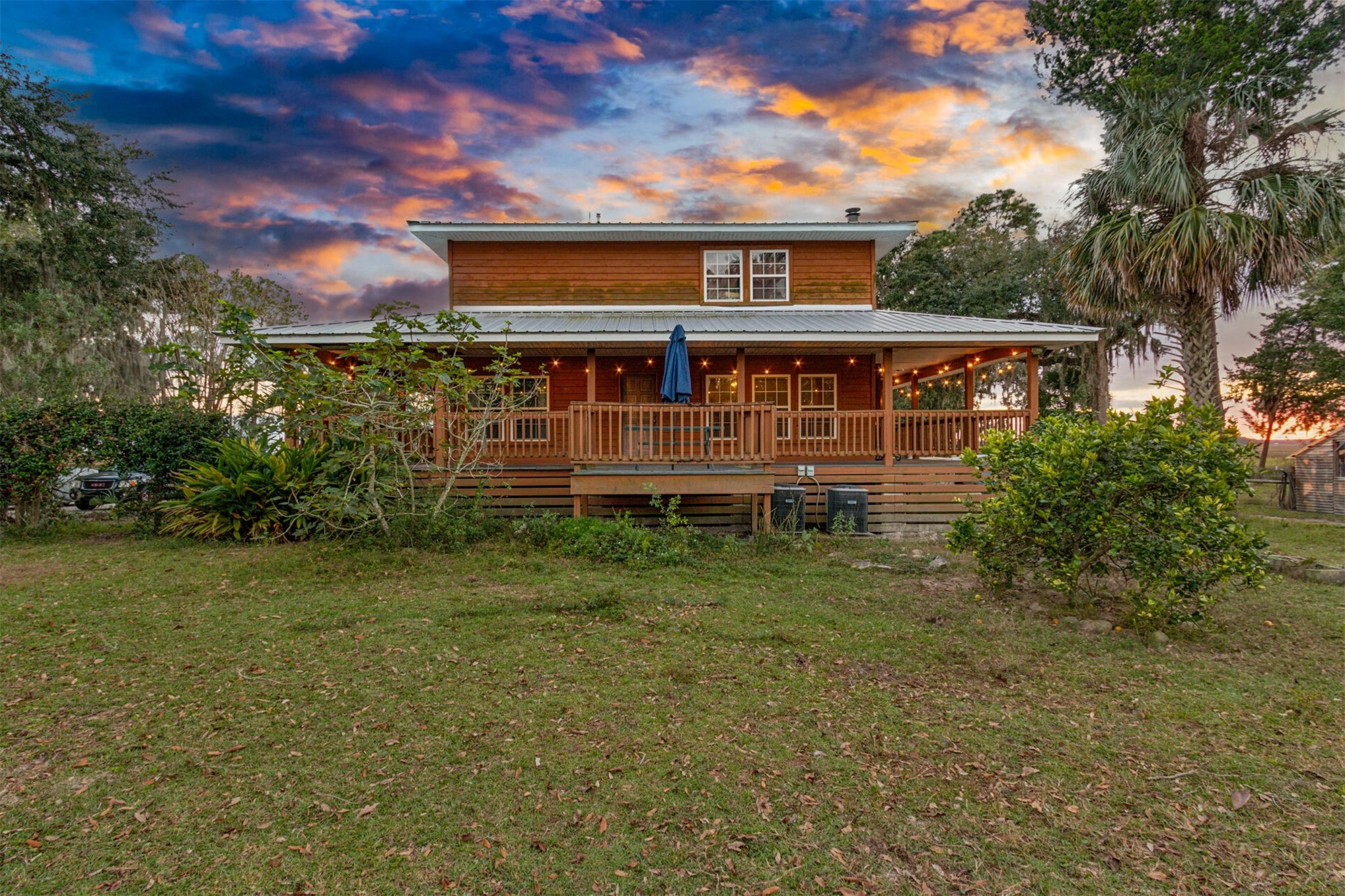 85013 Avant Road Yulee, FL 32097 - Photo 25 of 46 front view of a house with a yard