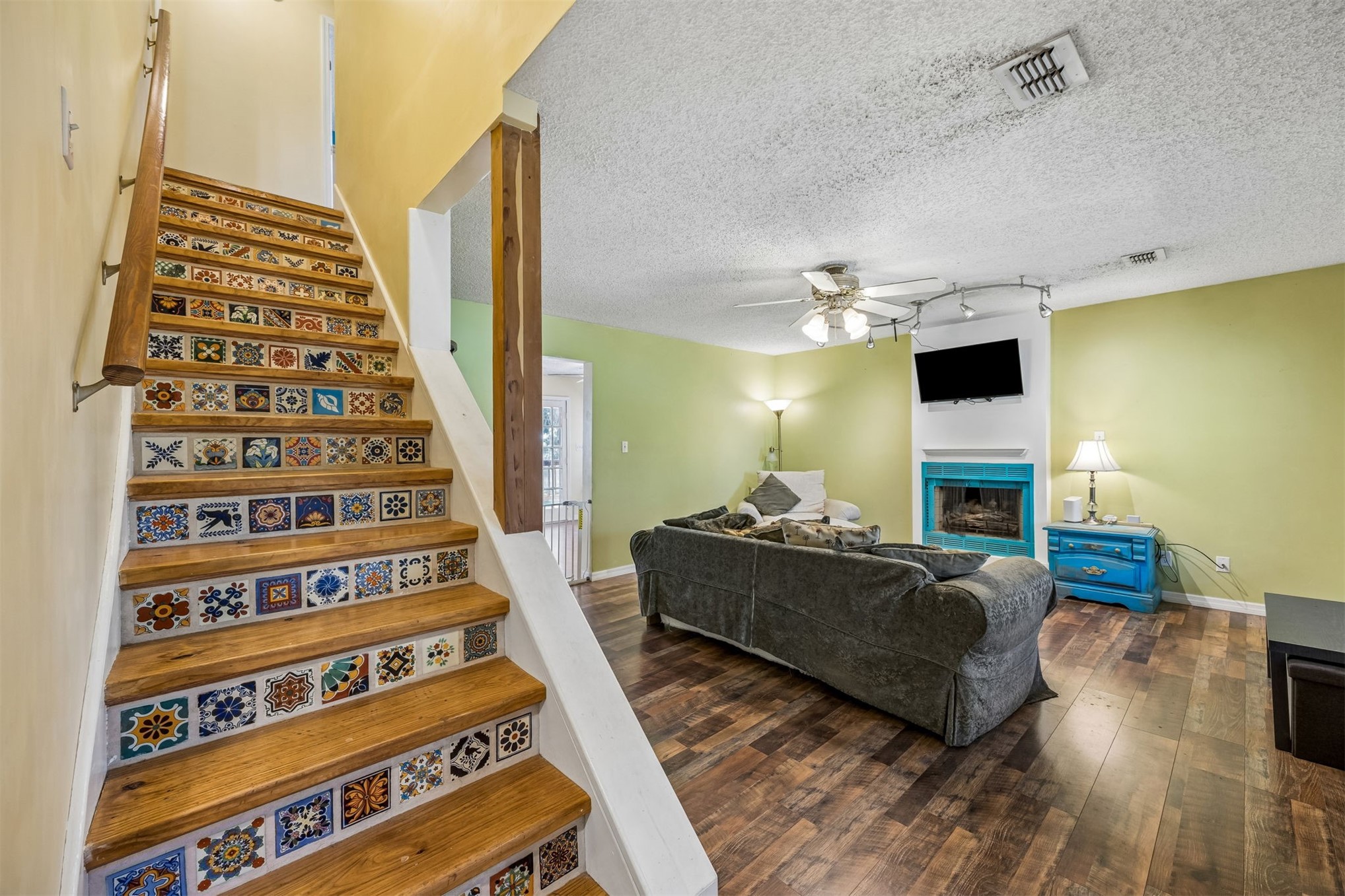 85013 Avant Road Yulee, FL 32097 - Photo 10 of 46 a living room with furniture and a fireplace