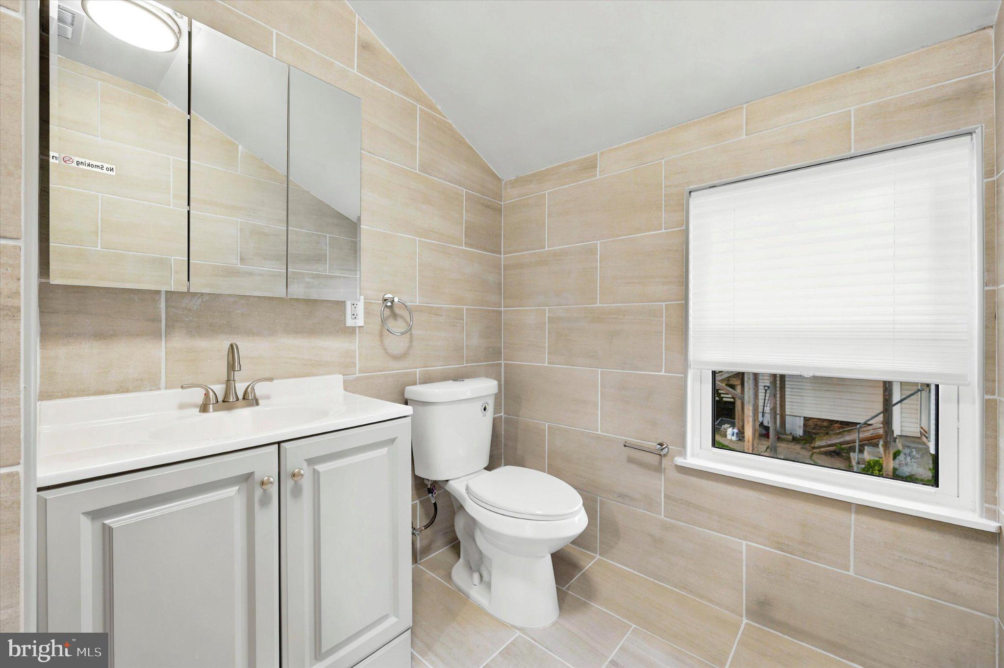 514 Ryers Avenue, Unit B Cheltenham, PA 19012 - Photo 18 of 21 Modern bathroom with sleek finishes.