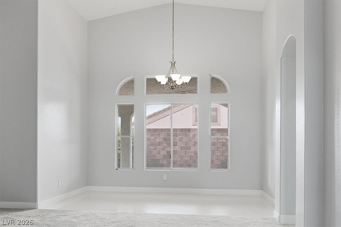 2413 Gold Camp Street Henderson, NV 89002 - Photo 30 of 66 separate dinning room with lighting and large windows with lots of light over looking the back yard.