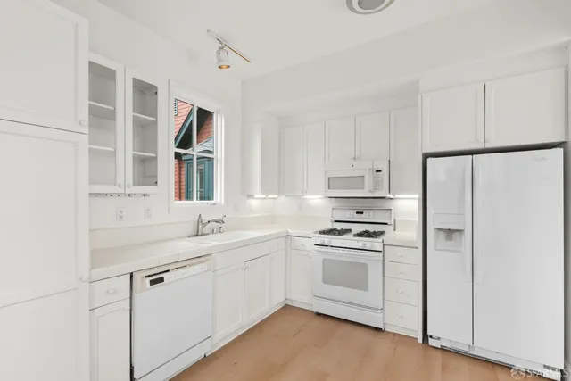 a view of parking garage with cars