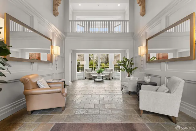 a view of a cafe with sitting area