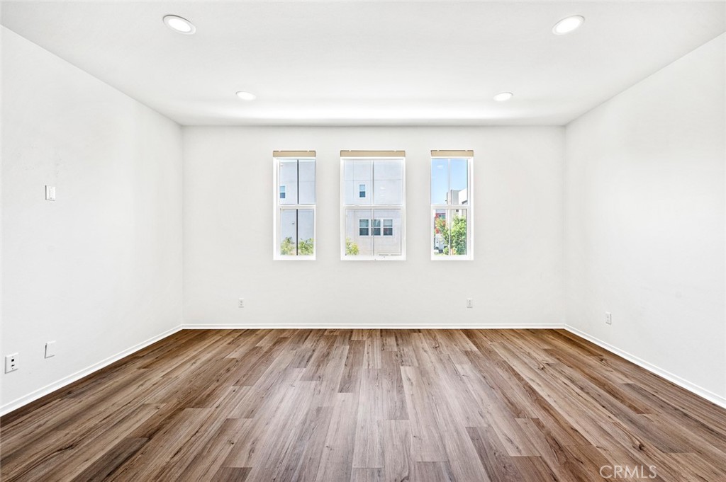 9560 Hammock Place Rancho Cucamonga, CA 91730 - Photo 15 of 48 a view of wooden floor in a room