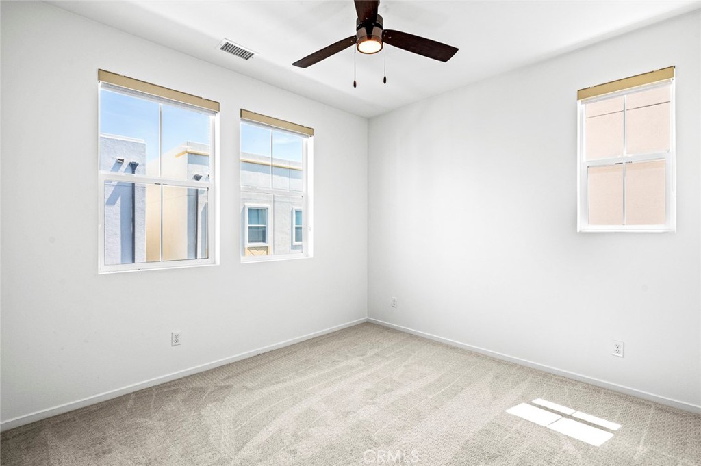 9560 Hammock Place Rancho Cucamonga, CA 91730 - Photo 20 of 48 a view of an empty room with a window