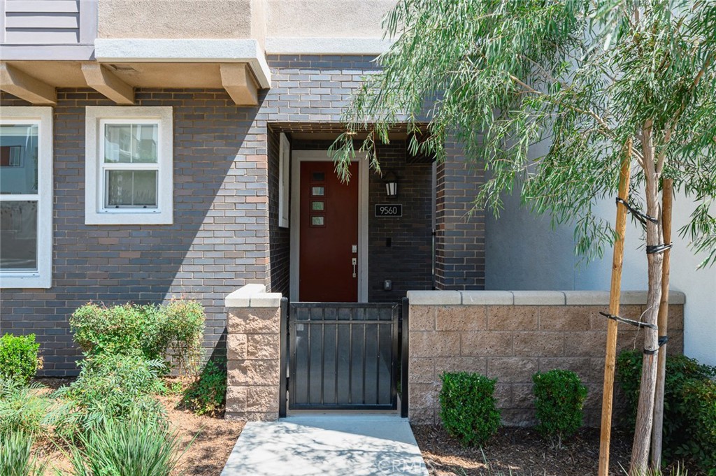 9560 Hammock Place Rancho Cucamonga, CA 91730 - Photo 2 of 48 front view of a house with a street