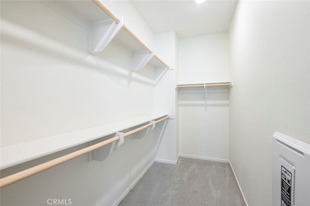 9560 Hammock Place Rancho Cucamonga, CA 91730 - Photo 27 of 48 a view of an empty walk in closet