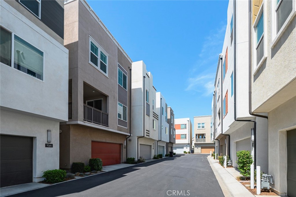 9560 Hammock Place Rancho Cucamonga, CA 91730 - Photo 32 of 48 a city street lined with buildings and a street