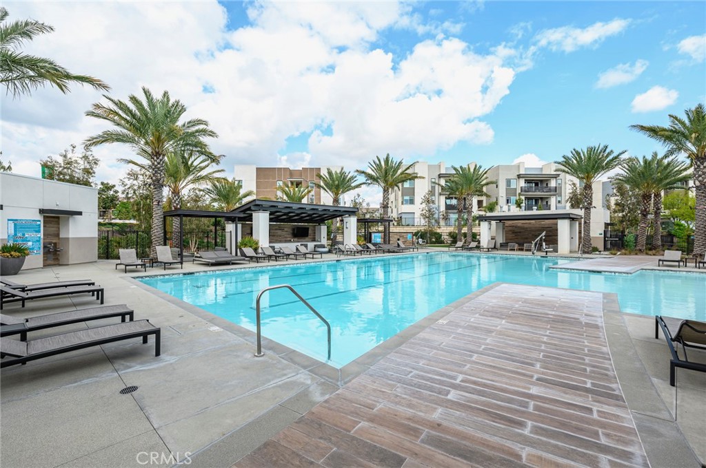 9560 Hammock Place Rancho Cucamonga, CA 91730 - Photo 40 of 48 a view of a swimming pool with a lounge chairs