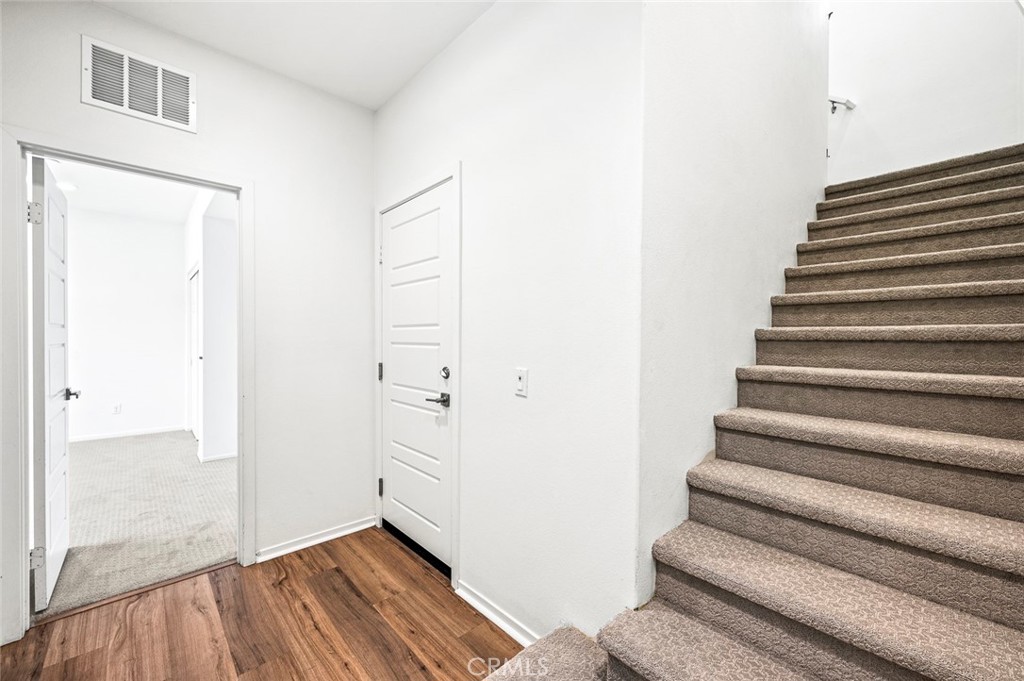 9560 Hammock Place Rancho Cucamonga, CA 91730 - Photo 4 of 48 a view of entryway with wooden floor