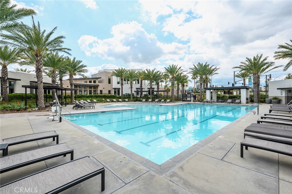 9560 Hammock Place Rancho Cucamonga, CA 91730 - Photo 44 of 48 a view of a swimming pool with a lounge chairs