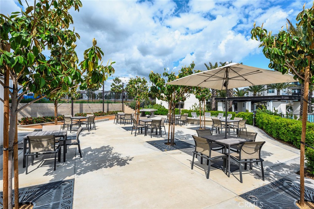 9560 Hammock Place Rancho Cucamonga, CA 91730 - Photo 46 of 48 an outdoor space with patio and white umbrellas