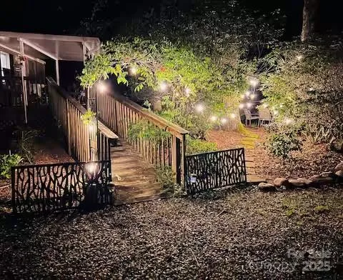 an aerial view of a house with a swimming pool