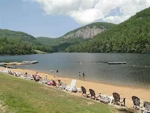 a view of a lake with a building in the background