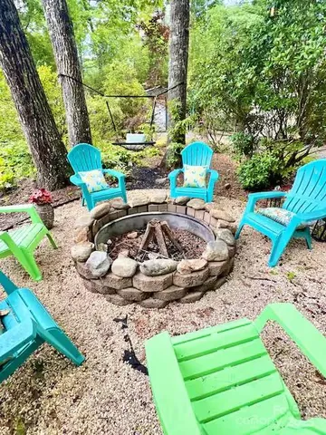 a view of a backyard with plants and a patio