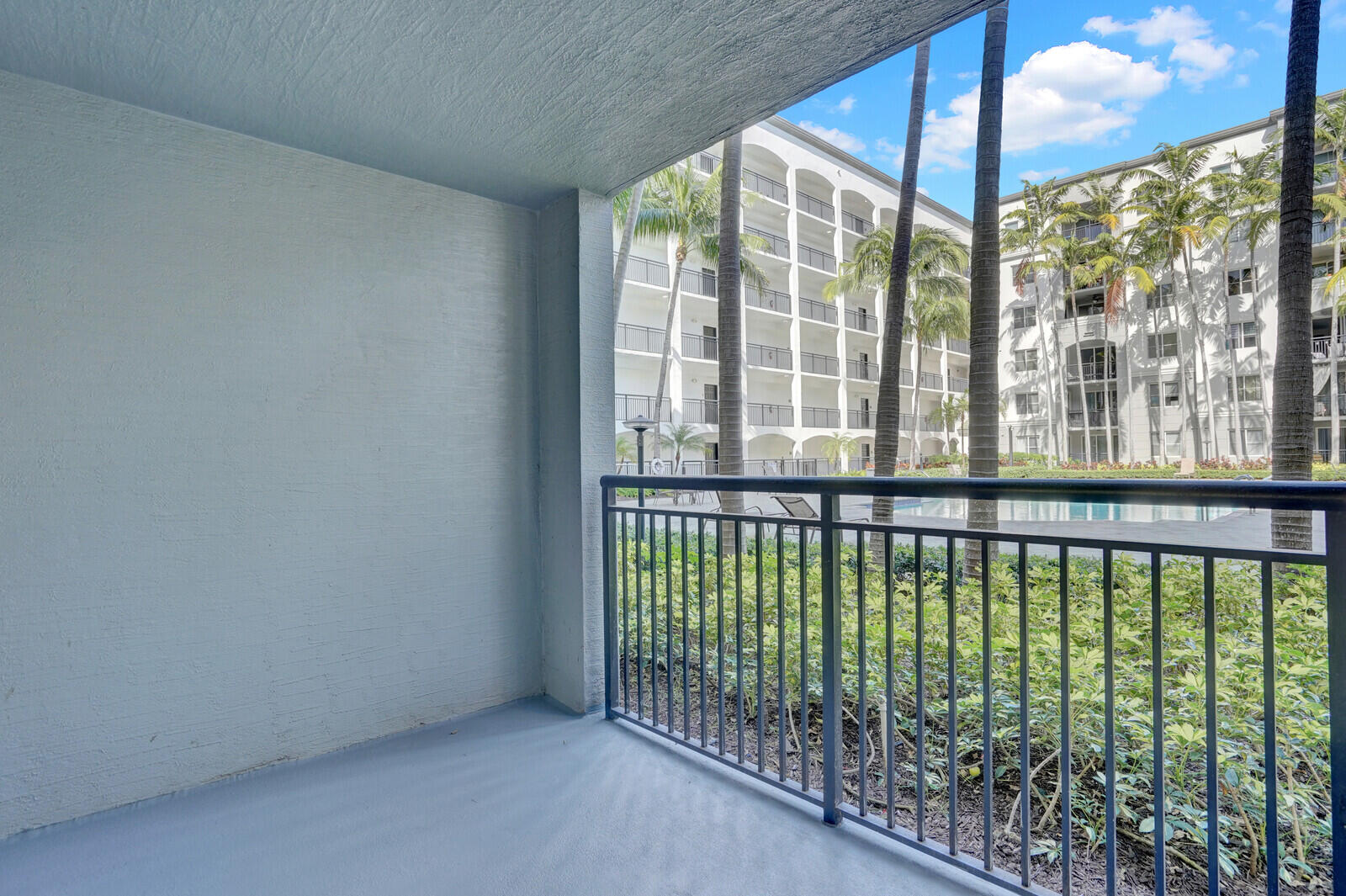 1690 Renaissance Commons Boulevard, Unit 1121 Boynton Beach, FL 33426 - Photo 20 of 32 a view of a large window with an outdoor space