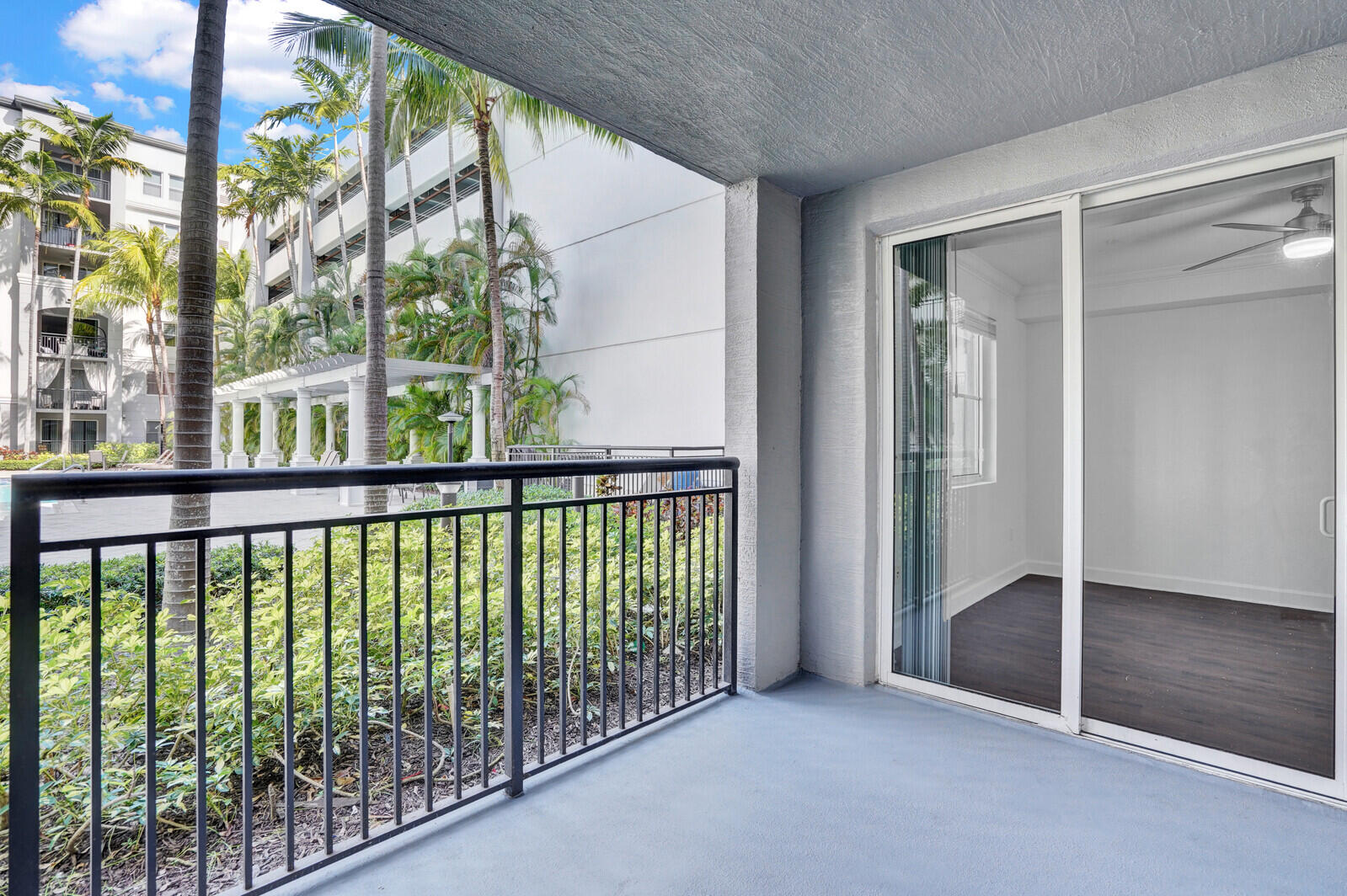 1690 Renaissance Commons Boulevard, Unit 1121 Boynton Beach, FL 33426 - Photo 21 of 32 a view of a balcony