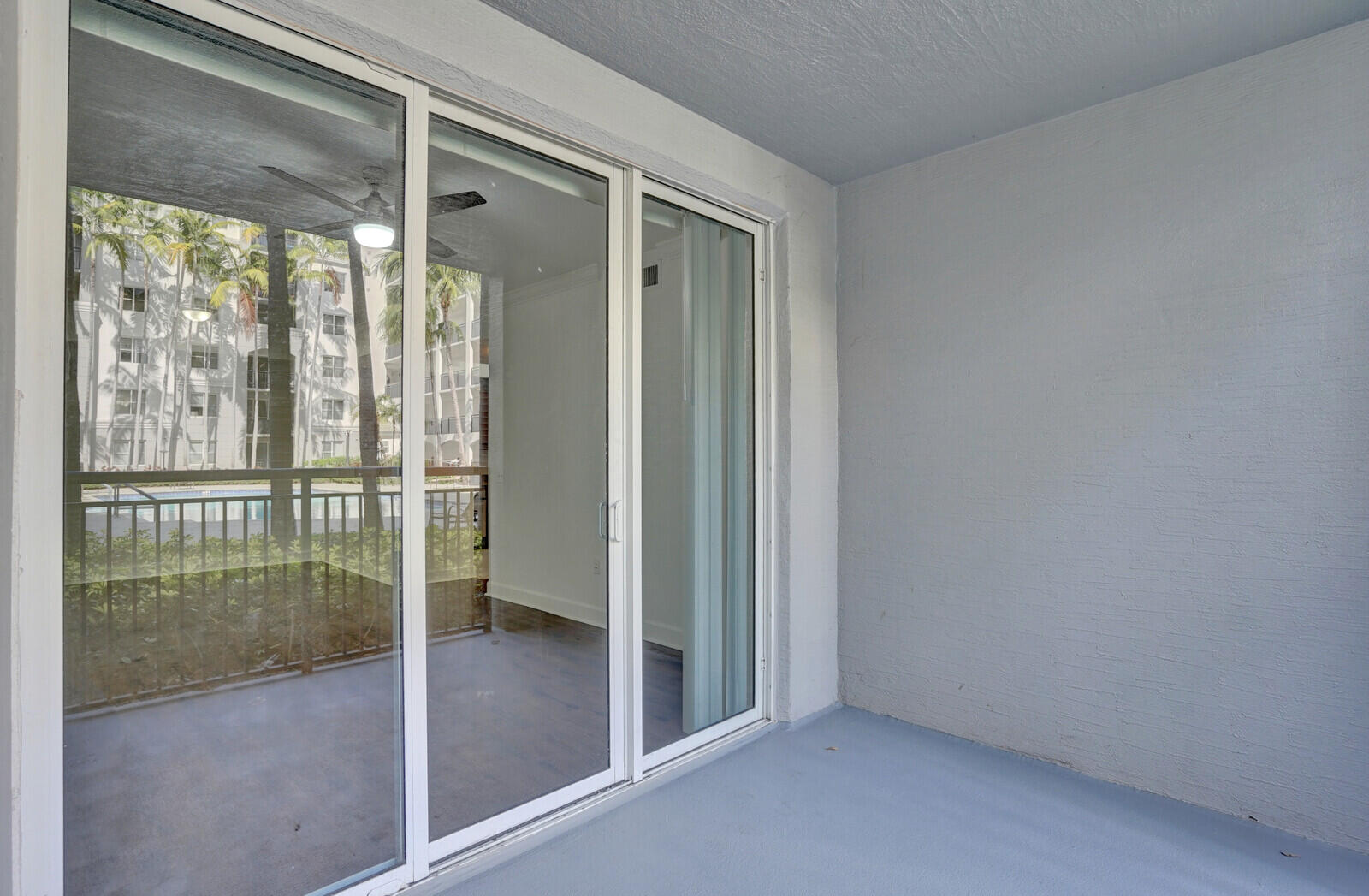 1690 Renaissance Commons Boulevard, Unit 1121 Boynton Beach, FL 33426 - Photo 23 of 32 a view of entryway with window