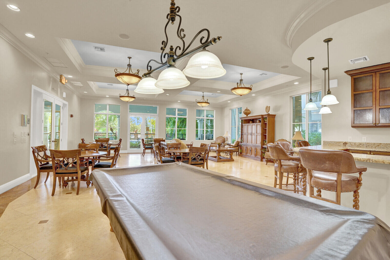 1690 Renaissance Commons Boulevard, Unit 1121 Boynton Beach, FL 33426 - Photo 31 of 35 a view of a dining room and livingroom view