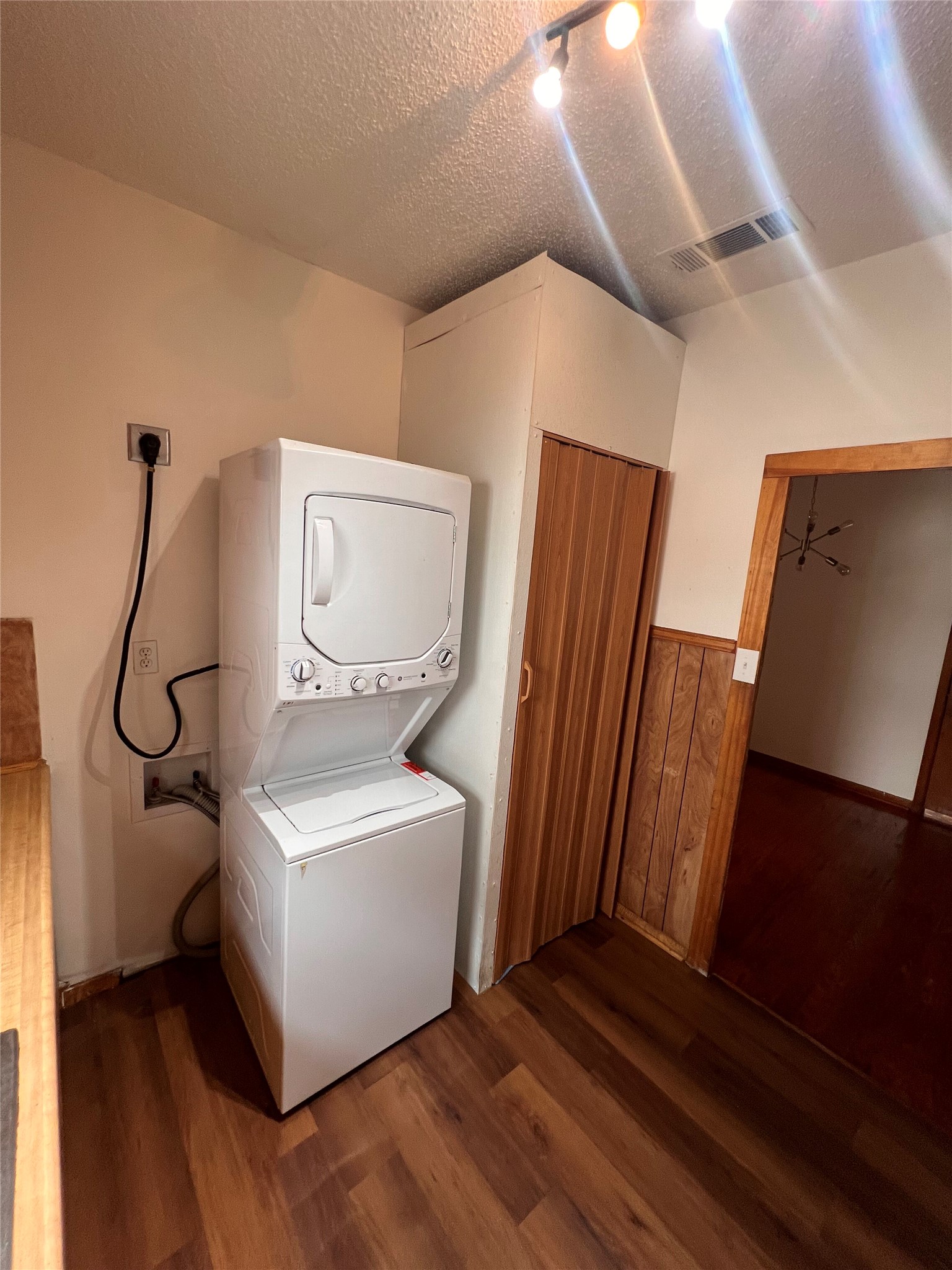 941 East 52nd Street Austin, TX 78751 - Photo 19 of 26 a view of a hallway with wooden floor and bathroom