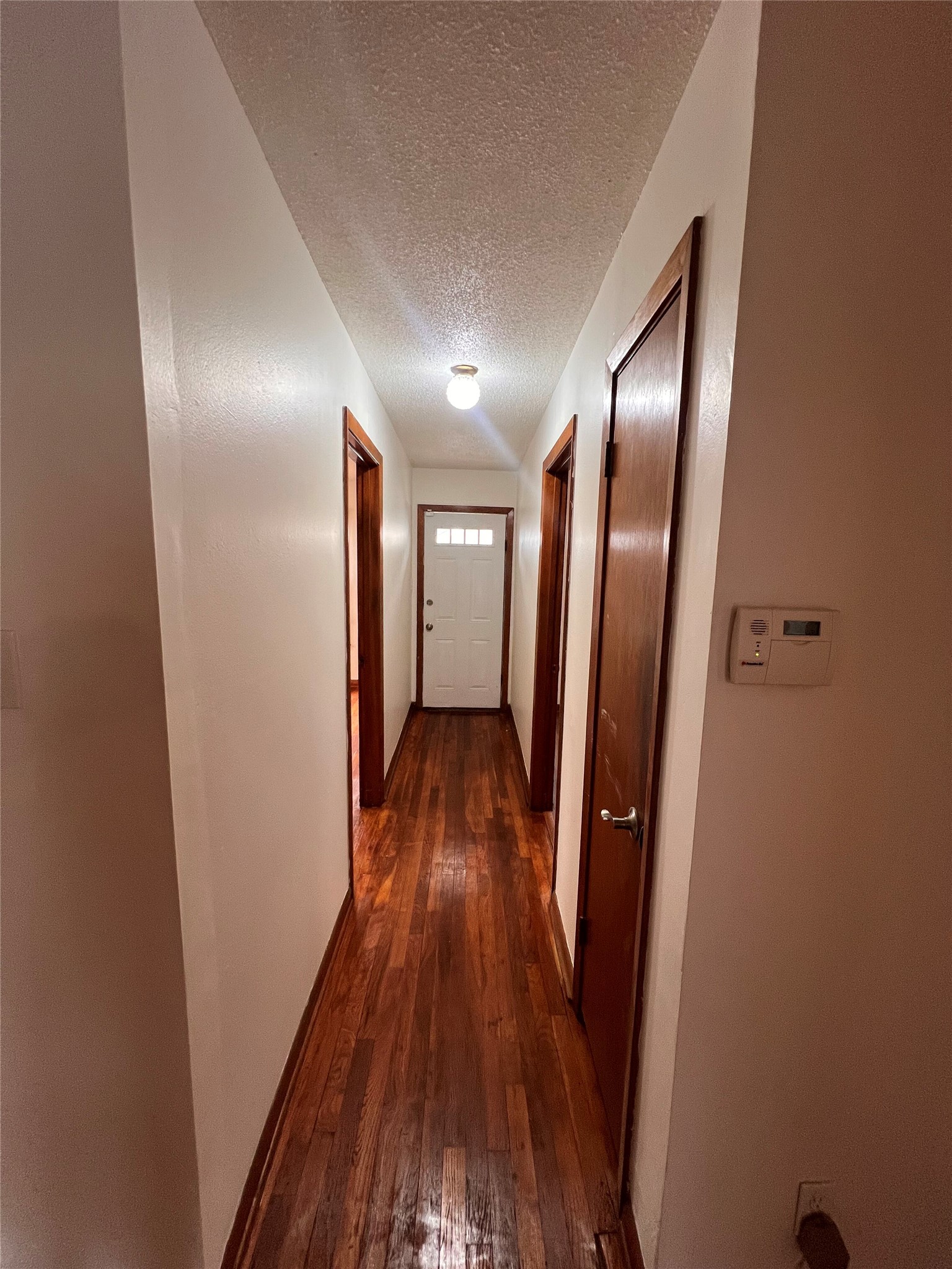 941 East 52nd Street Austin, TX 78751 - Photo 20 of 26 a view of hallway with wooden floor