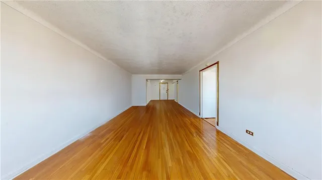 a view of a big room with wooden floor