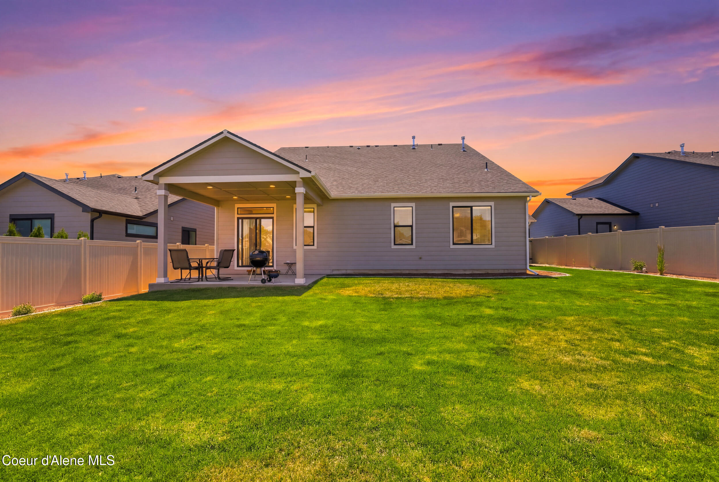 2450 West Victor Loop Coeur D'Alene, ID 83815 - Photo 37 of 49 Back Exterior at Dusk